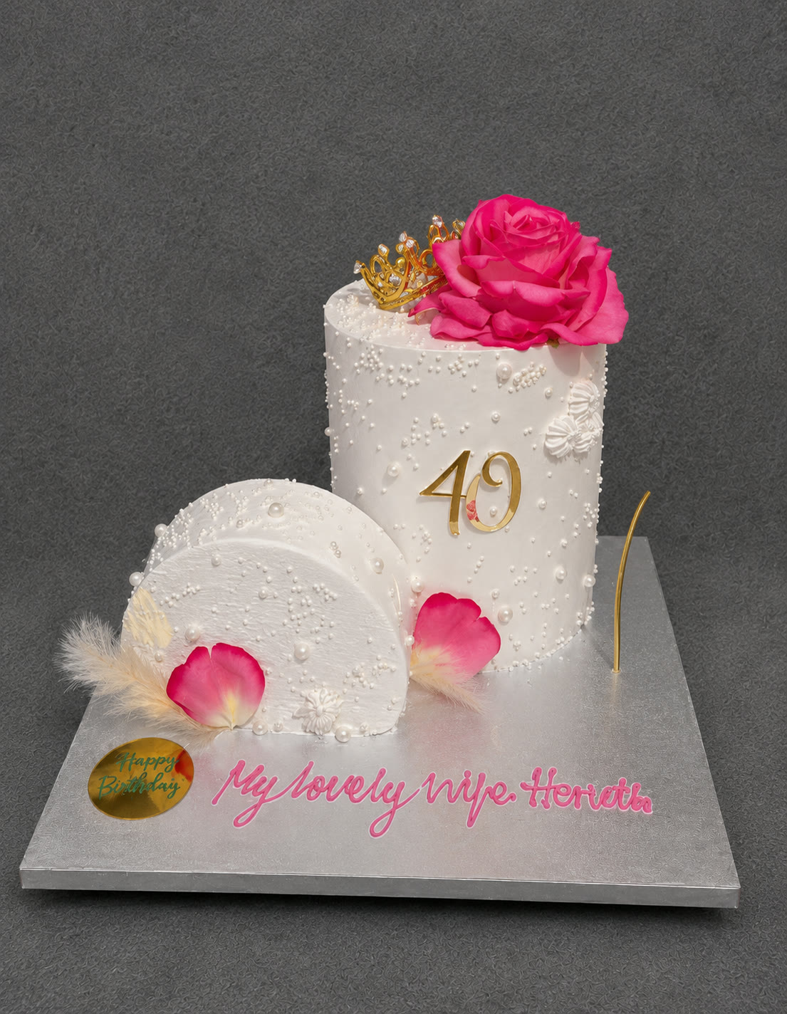 White 49th birthday cake with pink sugar roses